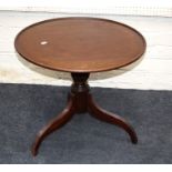 A Regency, mahogany dish-top tripod table with inverted sabre supports (reduces in height) 61cm