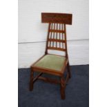 A 20th century Alen & Appleyard arts and crafts style walnut side chair with spindle back and flat