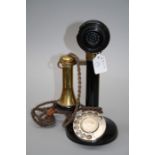 An early 20th century black lacquer and brass candlestick telephone. S234 No. 22. 31cms.