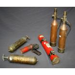 A collection of vintage fire extinguishers, to include two vintage 'Pyrene' and two 'Teletetra' exti