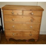 A Victorian stripped pine chest of Two short over Three long drawers. 105cm wide