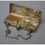 An early 20th century lady's silver compendium compact fashioned as an evening purse. import