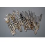 A Norwegian mid 20th century canteen, shaped concave handles comprising of 12 table forks, 12