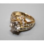 diamond ring; the principle brilliant cut diamond in raised six claw mount above brilliant and