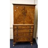 A Queen Anne style walnut linen press of small proportions. 76cm wide