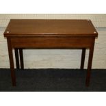 A 19th century oak supper table, the rectangular fold over top with single gate support on inner