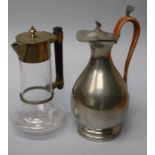 James Dixon and sons, a pewter coffee / hot water pot of baluster form with cane bound handle,