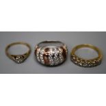 A five stone half hoop diamond ring, the brilliant cut diamonds in carved 18ct gold mount, a