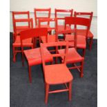 A mixed collection of Ten 20th century red painted children's  school chairs. Some with solid seats.