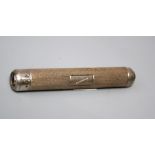 A 20th century Asprey of London silver pocket flashlight/ pen torch, with engine turned