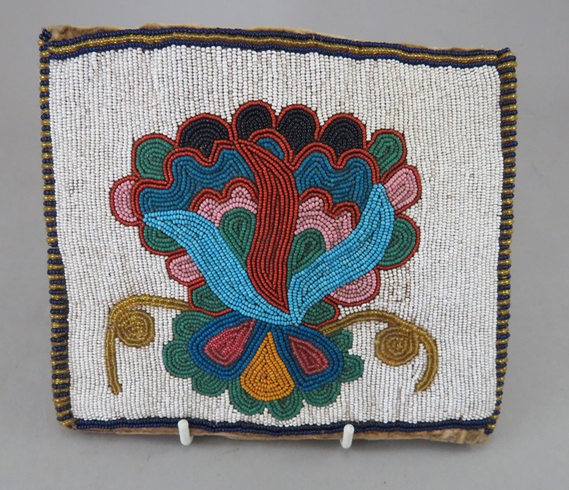 A mid-nineteenth century Native American beadwork purse or pouch, c.1850-75. It is expertly-made