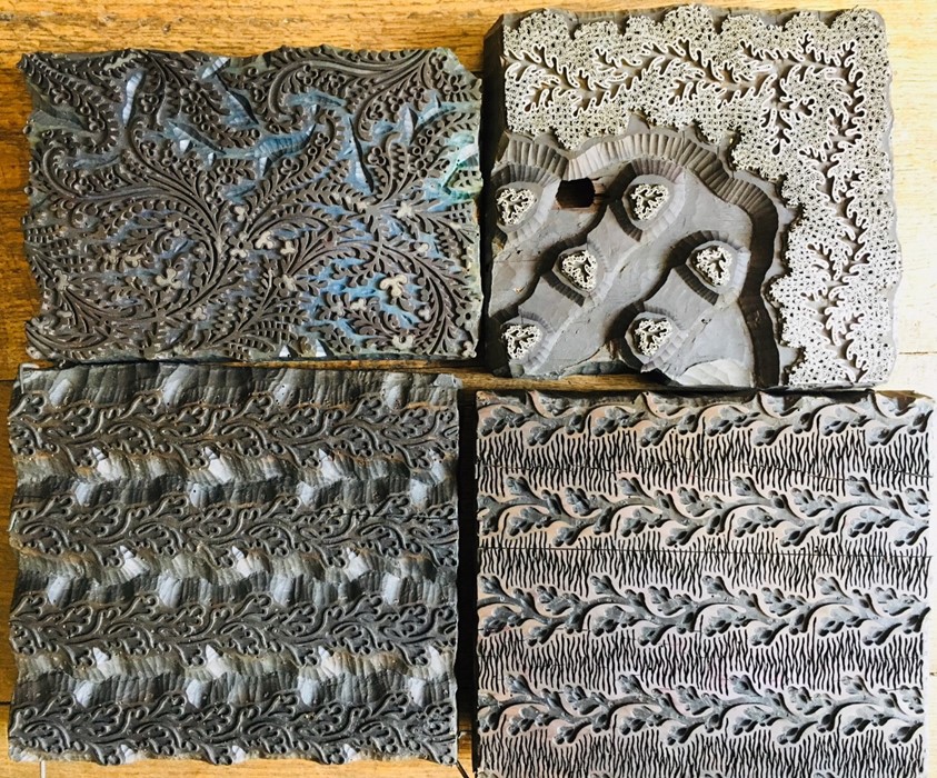 Collection of four silk printing blocks, carved wooden construction with handles, one with steel,