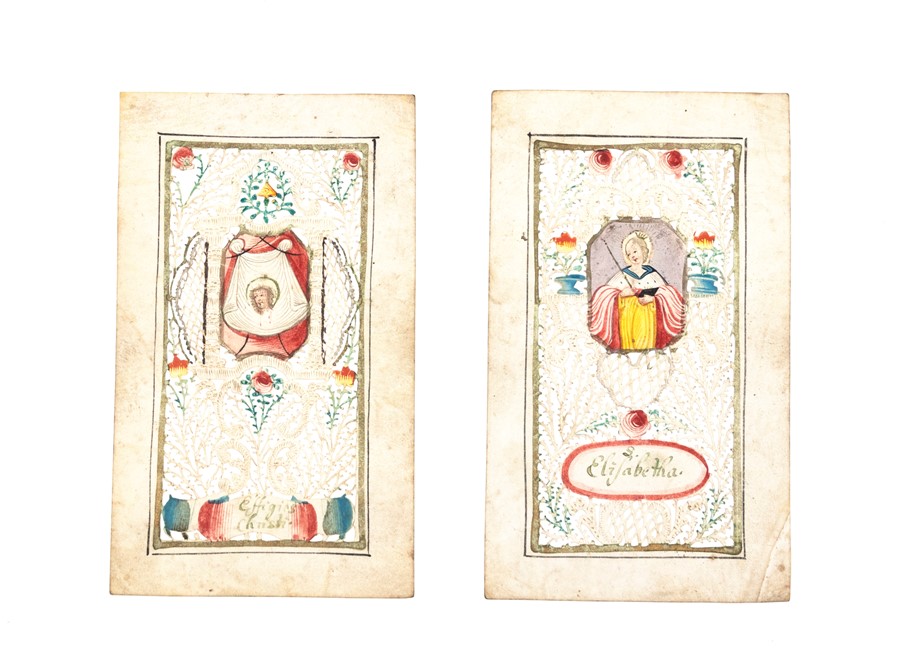 Two 18th-century devotional Valentines, elaborate cut-paper designs (handmade by nuns in France or