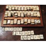 19th-century bone spelling alphabet, 182 tiles (upper and lower case on either side, plus blanks),