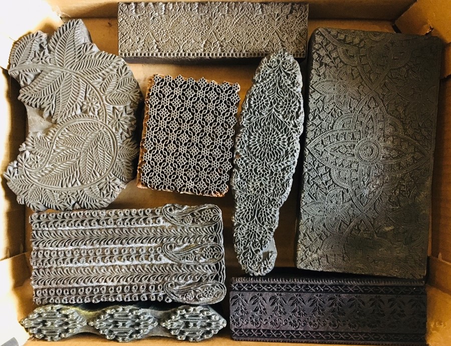 Collection of eight Indian textile printing blocks, carved wooden construction with handles, two