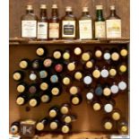 Approximately 60 rare whisky miniatures including Glenfarclas, Glenlivet, Glendranach, Glencoe,