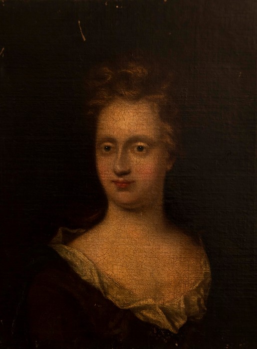 Circle of Sir Godfrey Kneller, portrait of a lady, bust length in a brown dress and blue wrap, oil