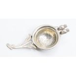 An Edwardian novelty silver tea strainer, by Levi & Salaman, Birmingham 1907, having a pair of