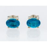 A pair of apatite and silver studs, oval faceted apatite set in four claw mounts, size approx 6mm