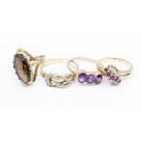 Four 9ct gold gem-set rings, including amethyst, smokey quartz, ruby and diamond, sizes S, P1/2,