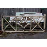 A 19th / early 20th Century white painted wooden gate, lattice work, 110cm high, 290cm wide