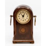 An inlaid mahogany desk clock, German by Precista, the case with twin handles on plinth base with