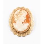 A 9ct gold mounted cameo brooch, depicting bust portrait of a lady, fancy engraved mount, size 30