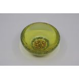 An unusual Italian 'uranium' glass millefiori bowl, mid 20th Century, of rounded form, the yellow