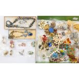 A group of costume jewellery - brooches, earrings, necklaces, cufflinks, etc