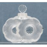 A Lalique frosted glass scent bottle, fashioned in the form of rosettes, 9cms high approx