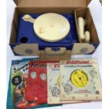 Marx Lumar toy gramophone, plus records