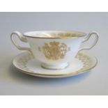 A Wedgwood  Eric Ravillious,  Coronation Soup bowl and Stand, Decorated in white and gilt  Gold
