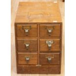 A George V 1920/30's Libraco of London six drawer oak filing cabinet of carcass construction with