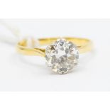 A diamond and 18ct gold solitaire ring, the central old cut diamond measuring approx. 1.5carats,