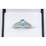 Rocks & Co - an 18k white gold, paraiba tourmaline and diamond ring, size P1/2, approx 3.5gms gross,