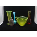A group of coloured glassware, early 20th Century, including an art deco style uranium vase, 20cm