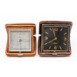 Two Swiss travel clocks, the eight day movements in square cases; one dark brown crocodile, the