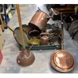 A collection of metal wares including brass jam pans, watering cans, kettles, candlesticks, scales