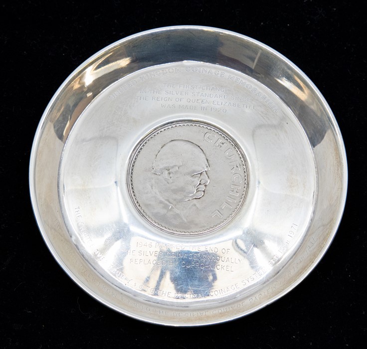A modern silver United Kingdom Coinage Memorabilia dish inset with Winston Churchill / HM Queen