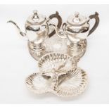 A matching EPNS Deluxe teapot and coffee pot and a three shell section serving dish with a foliate
