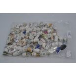 Thimbles: a large collection of assorted ceramic thimbles, of various subjects, including floral,