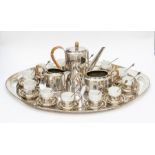 An Art Deco silver plated coffee service, comprising coffee pot, cream jug, two handled sugar