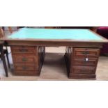A large mahogany partners desk, drawers to either side, large leather insert, circa 1900, 78cm high,