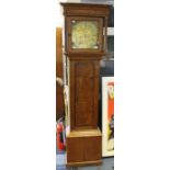 A George III eight day oak and mahogany cross-banded longcase clock, the dial inscribed 'John