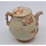 A Qingbai-style wine ewer and cover, of pear shape and decorated with a pale sea-green glaze