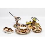 Two Royal Crown Derby china bird figures, long tail tit, blue tit and chicks, 1218 table lighter,