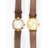 Longines: A vintage gold plated Ladies wrist watch, quartz oval gold tone dial (2cm long), Roman