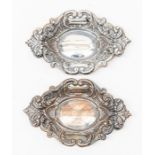 Two late 19th Century Sheffield plate pin dishes, embossed decoration, stamped CR: overall condition