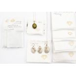 A pair of sterling silver and citrine earrings, with matching pendant and bracelet; a silver and