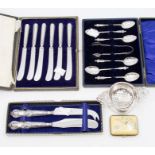 A collection of silver to include George VI tea strainer and mount, Birmingham, 1945; white metal